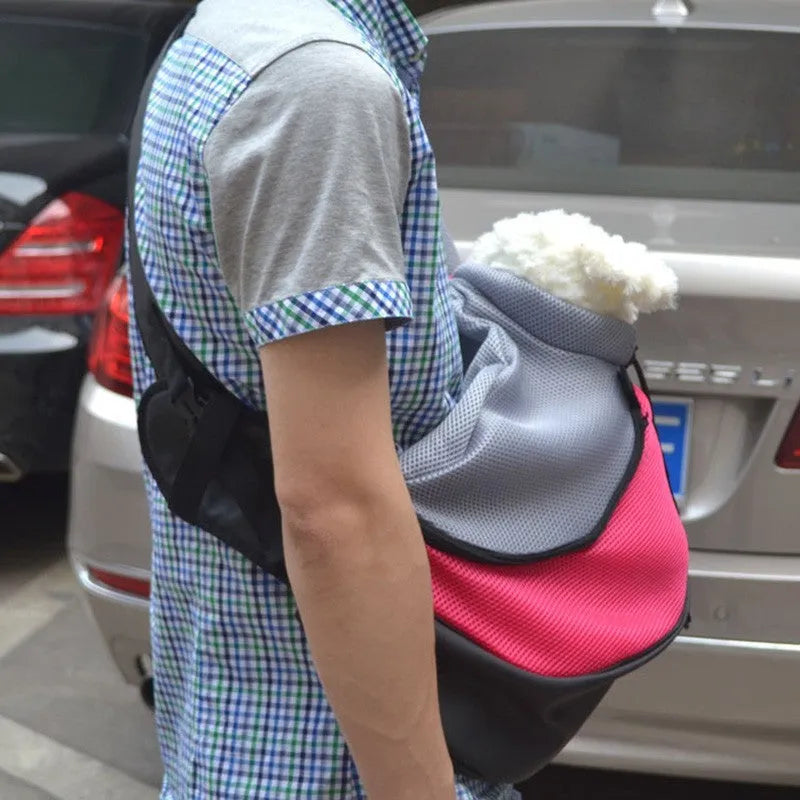 Polyester pet backpack carrier in blue colour with mesh windows and adjustable straps
