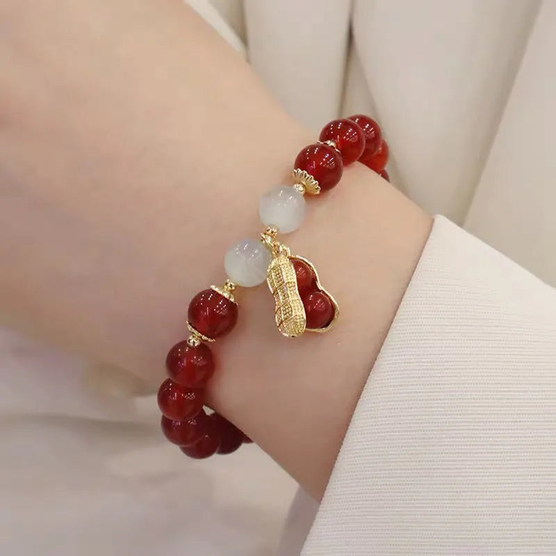 Chinese style glass bamboo leaf bracelet for women with manual craft details.