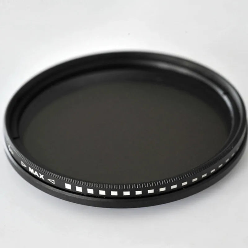 Set of circular camera lens filters in multiple sizes including ND-2, ND-4, ND-8, and ND-400 neutral density filters.