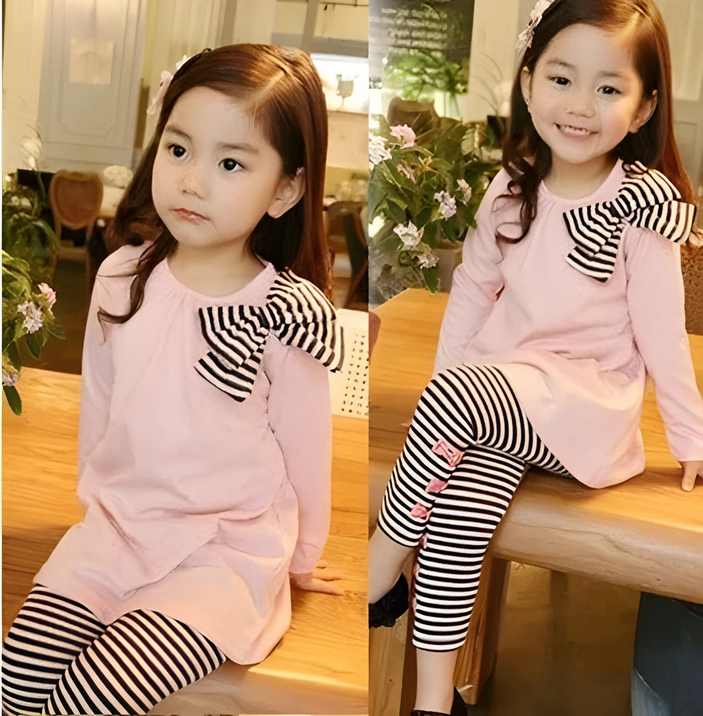 Girls' pink cotton two-piece clothing set shown in sizes 110cm, 120cm, 130cm, and 140cm