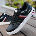 Sports shoes in black grey and white showing Asian sizes 39 to 44 for running and training