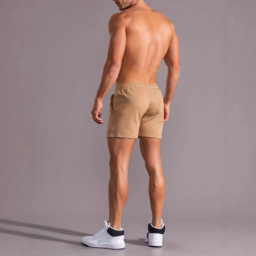 Men's khaki coconut print sports shorts with straight cut design and micro elastic fabric