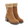 Snow boots in black, grey, green, and orange colours with a plush lining and rubber insole.