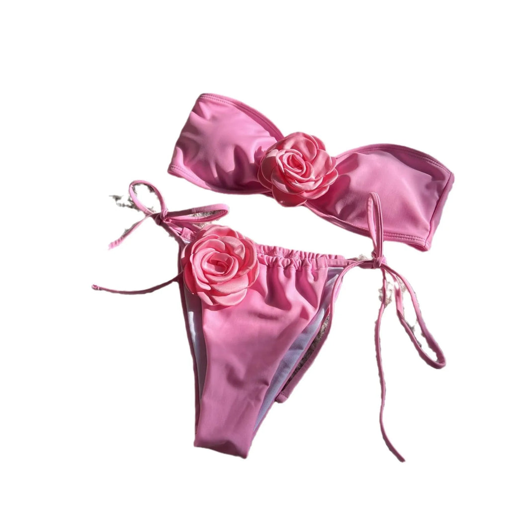 Solid colour women's tube top swimsuit with drawstring straps on a mannequin.