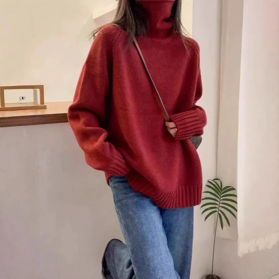 Women's loose turtleneck sweater with a thick curling pile collar in a choice of four colours.