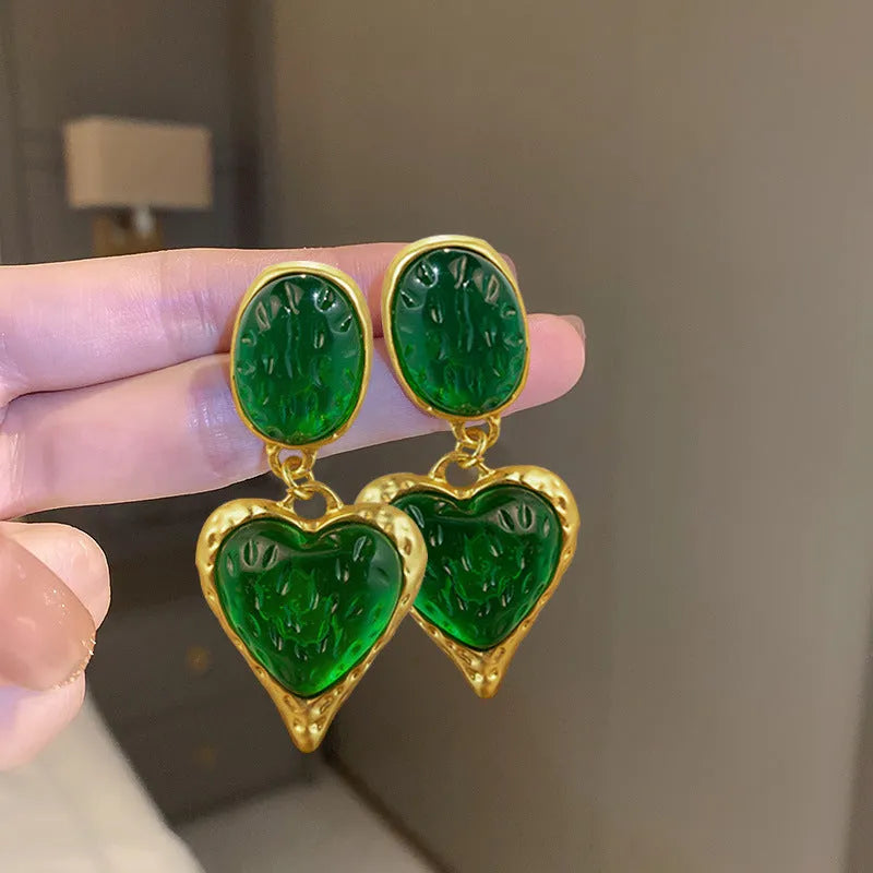 Silver needle pleated oval love heart stud earrings in purple, red, green, and yellow and white colours.