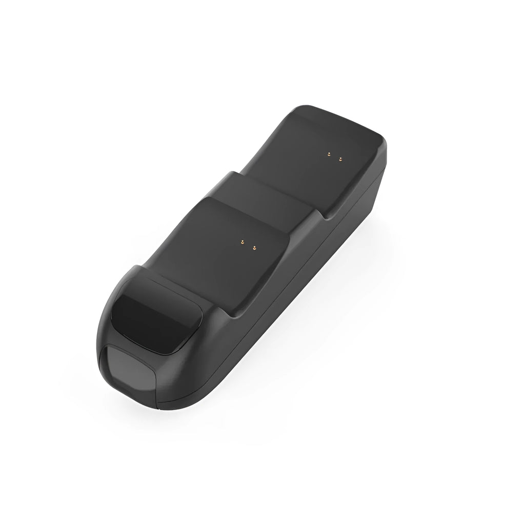 Black wireless charging station for two Xbox Series X|S controllers with LED lights, shown with battery packs.