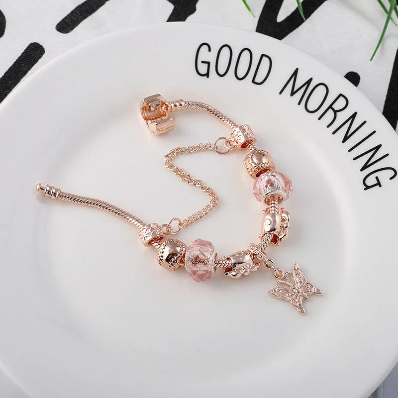 Rose gold geometric love bracelet on display with alloy plating finish