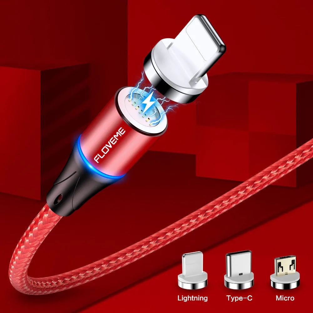 Black magnetic data cable with LED light on connector next to smartphone
