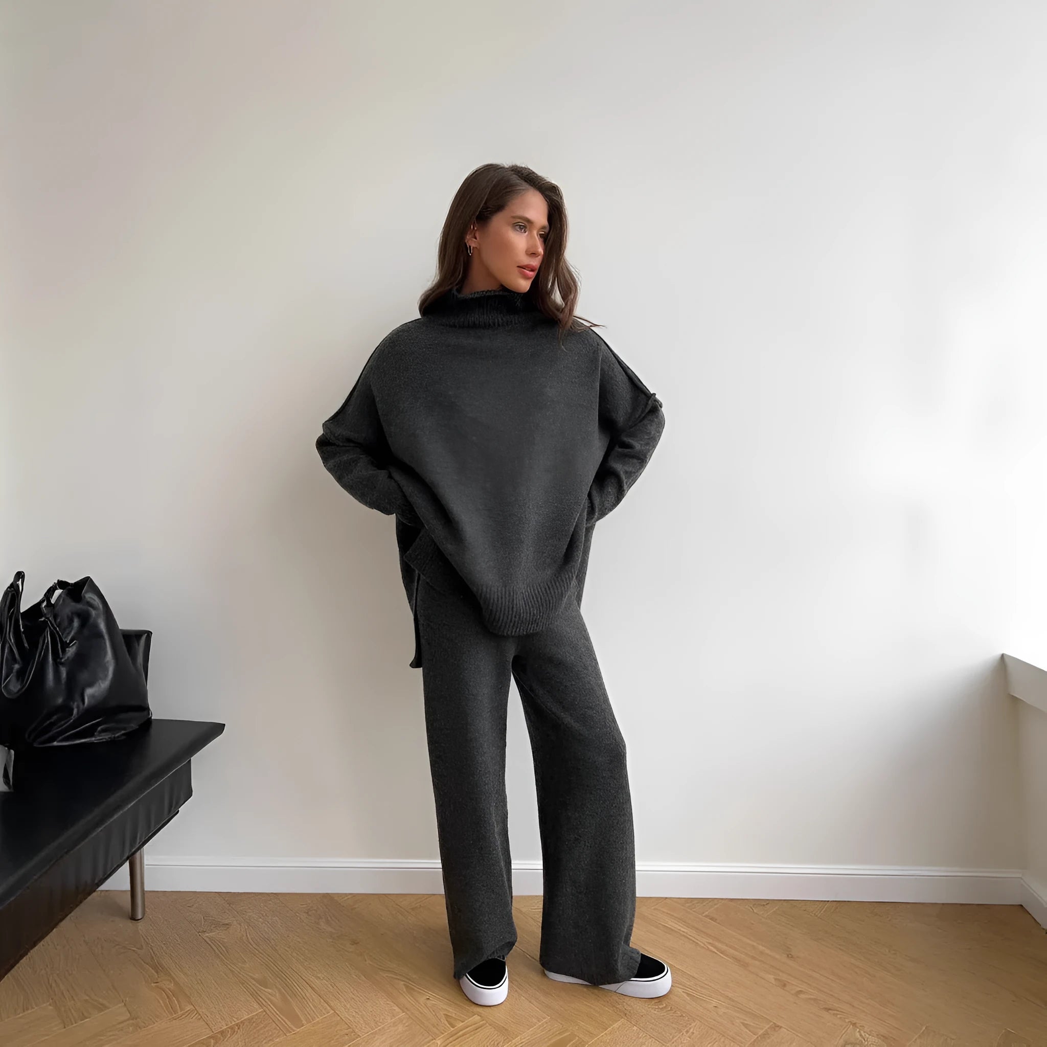 Women's acrylic suit with side-slit sweater top and matching trousers in solid colour