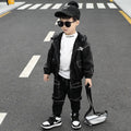 Children's natural coloured cotton three-piece suit with jacket and jeans in black for little boys
