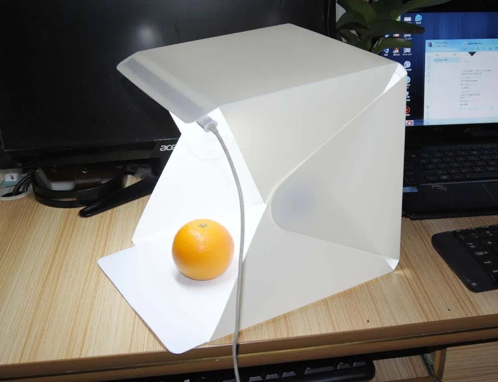 40cm folding soft light box with adjustable LED ring light and six colourful background cloths for product photography.
