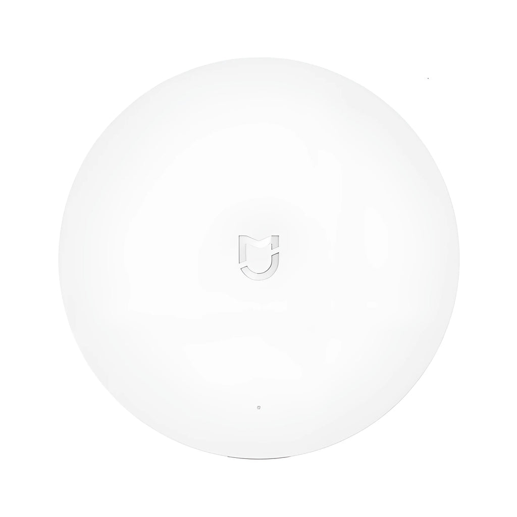 White circular Xiaomijia smart home gateway with UK plug for wireless wall switch control