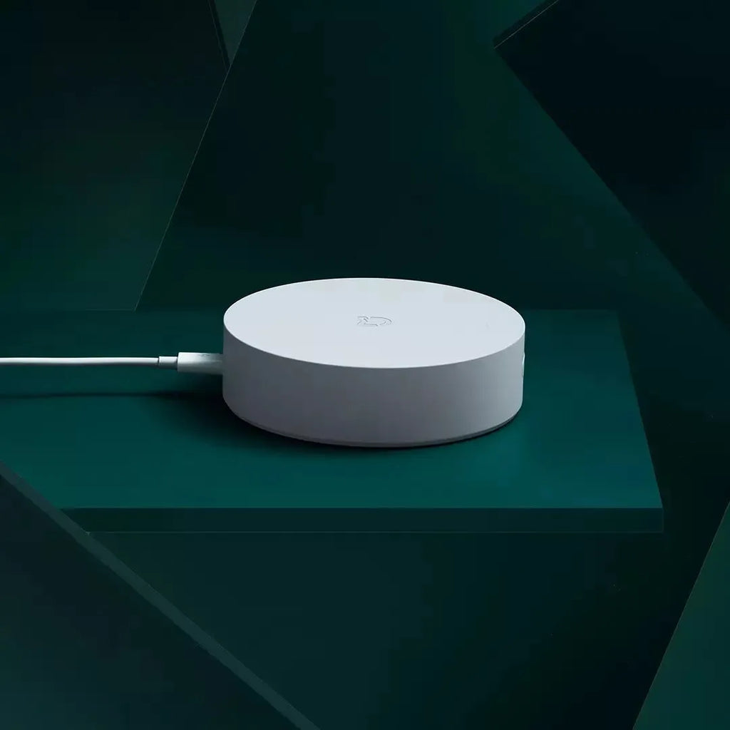 White circular Xiaomijia smart home gateway with UK plug for wireless wall switch control