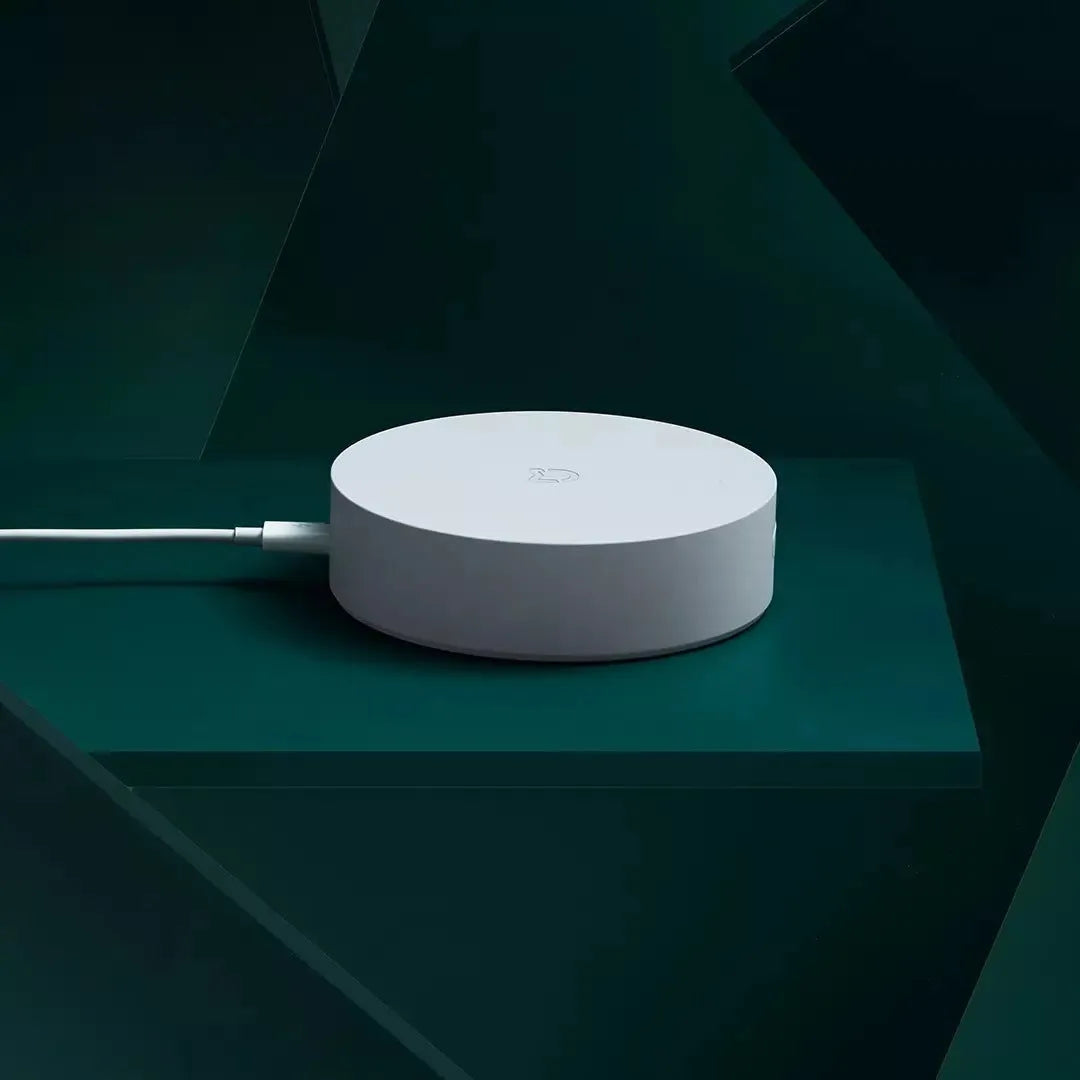 White circular Xiaomijia smart home gateway with UK plug for wireless wall switch control