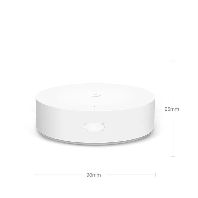 White circular Xiaomijia smart home gateway with UK plug for wireless wall switch control