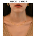 Gold titanium steel necklace with round circle, waterdrop and rectangle charms on a cross chain, adjustable 21-50cm.