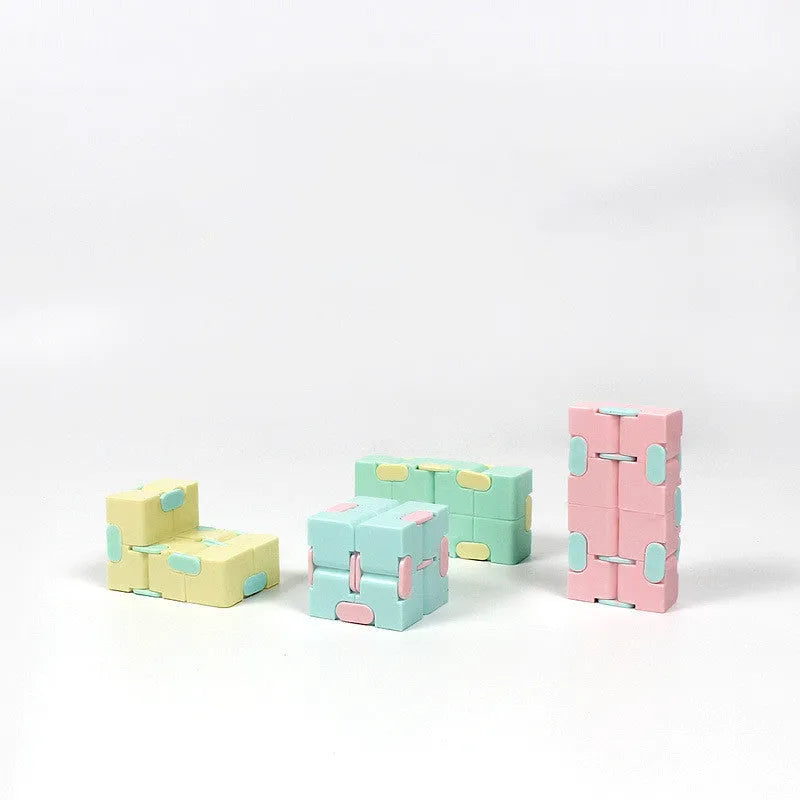 Infinity cube fidget puzzle toy in random colour, showing eight cubes that rotate freely in any direction