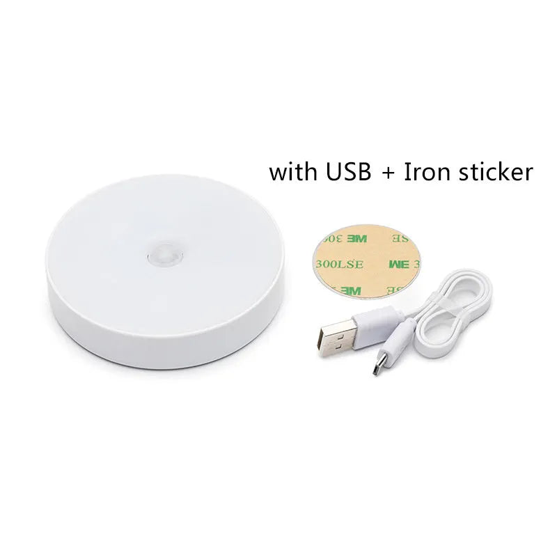 Small round motion sensing LED night light with USB charging port in beige colour