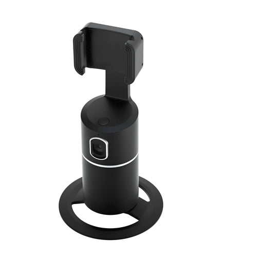Black, pink, or white smartphone tracking gimbal with 360-degree rotation on a desk.
