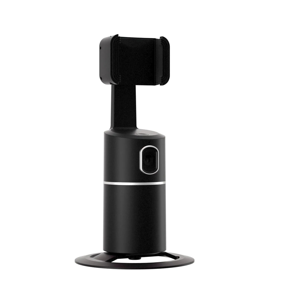 Black, pink, or white smartphone tracking gimbal with 360-degree rotation on a desk.