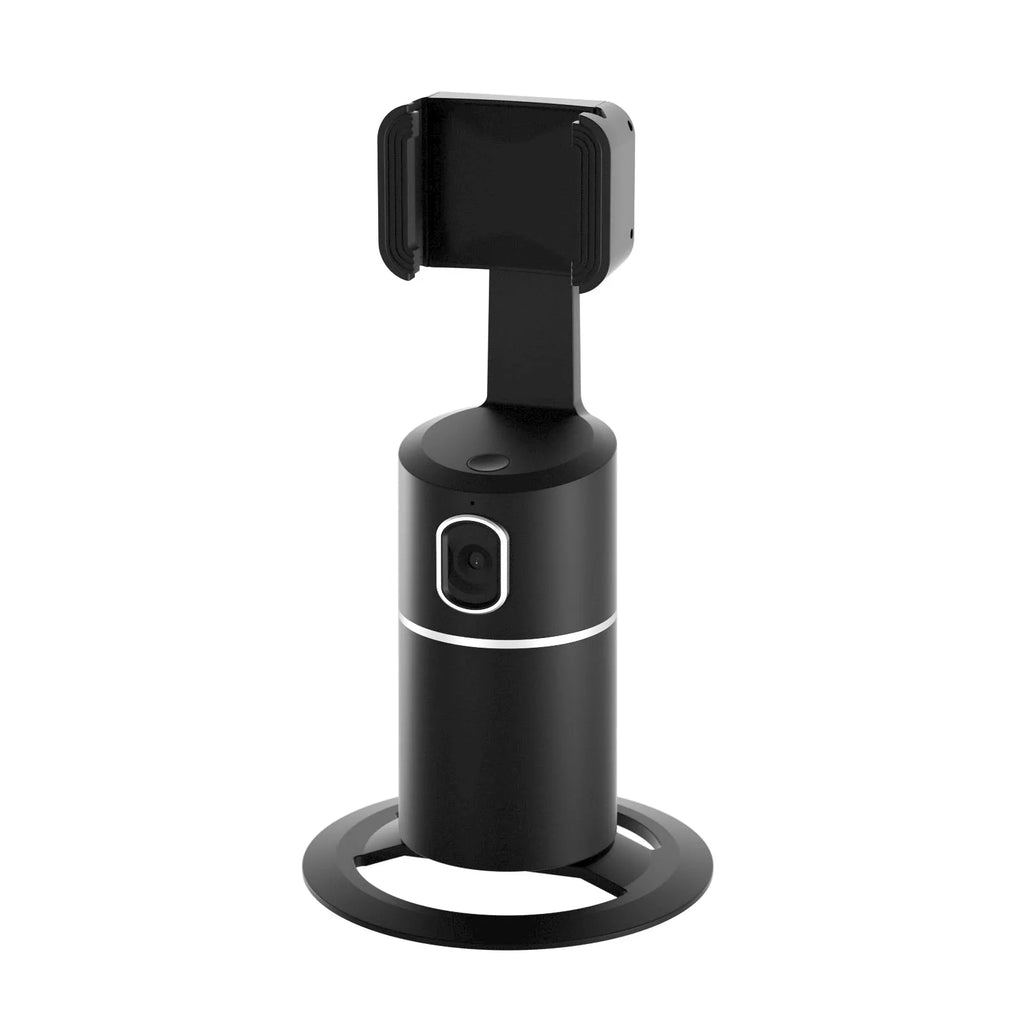 Black, pink, or white smartphone tracking gimbal with 360-degree rotation on a desk.
