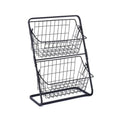 Black two-tier stainless steel kitchen storage rack with fruit and vegetables on countertop