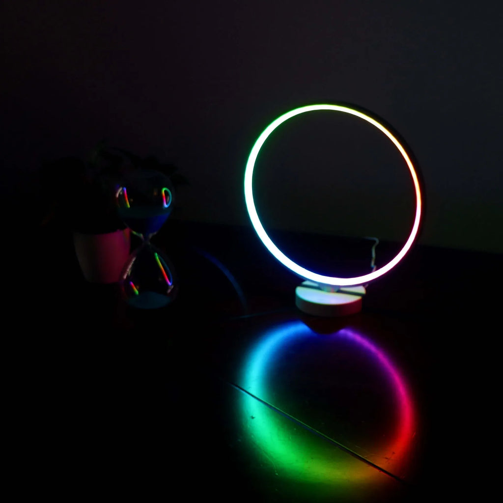 White Full Moon table lamp with remote control showing adjustable colour temperature and RGBW lighting options