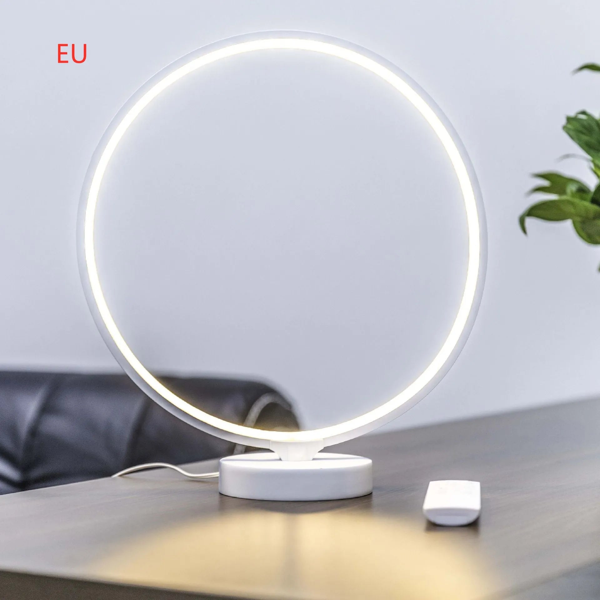 White Full Moon table lamp with remote control showing adjustable colour temperature and RGBW lighting options