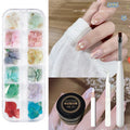 Mixed box of metal rivets and rhinestone nail decorations with eleven style options including hollow rivets and pearl rhinestones