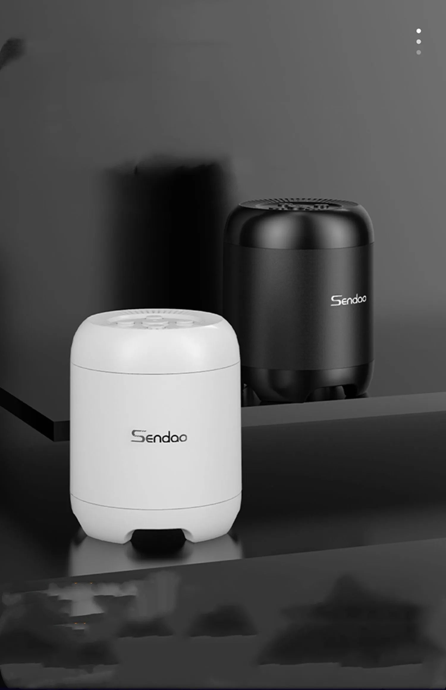 Small black or white portable Bluetooth speaker with card reader slot showing 90x73x73mm dimensions