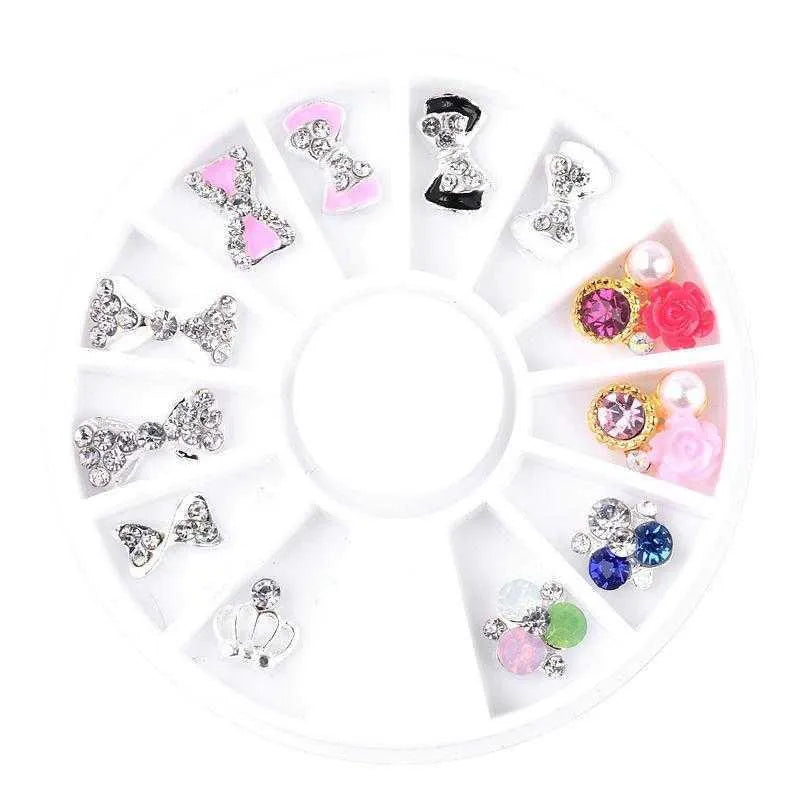 Wheel of 3D alloy nail charms with rhinestones in gold, transparent and colour, including bow, flower and perfume bottle shapes