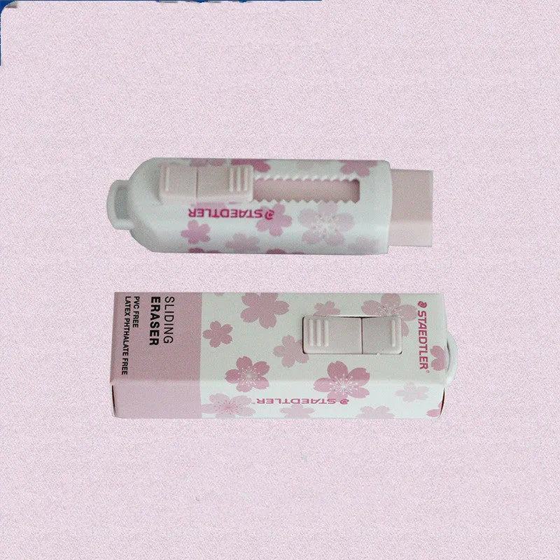 Pink square push-pull whiteboard eraser for students with replaceable core.