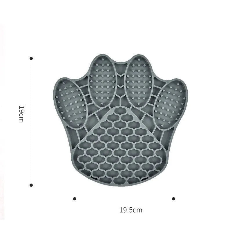 Claw-shaped silicone slow food mat in blue for dog or cat feeding