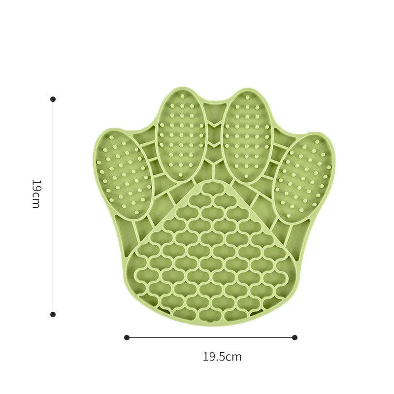 Claw-shaped silicone slow food mat in blue for dog or cat feeding