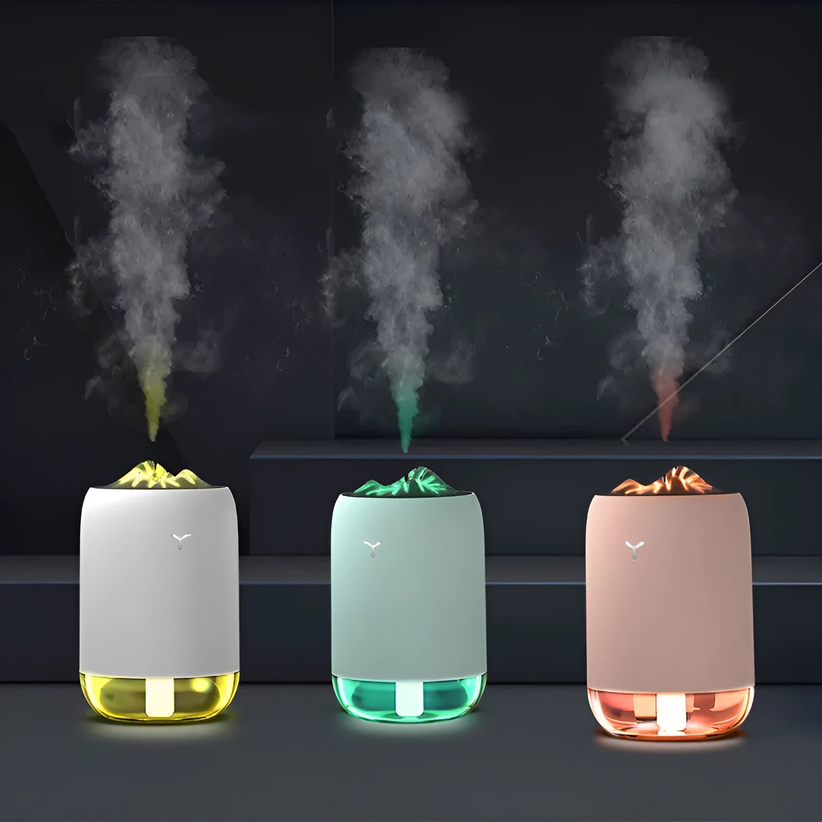 Magic Flame ultrasonic humidifier and aroma diffuser in white, light blue or pink column design.