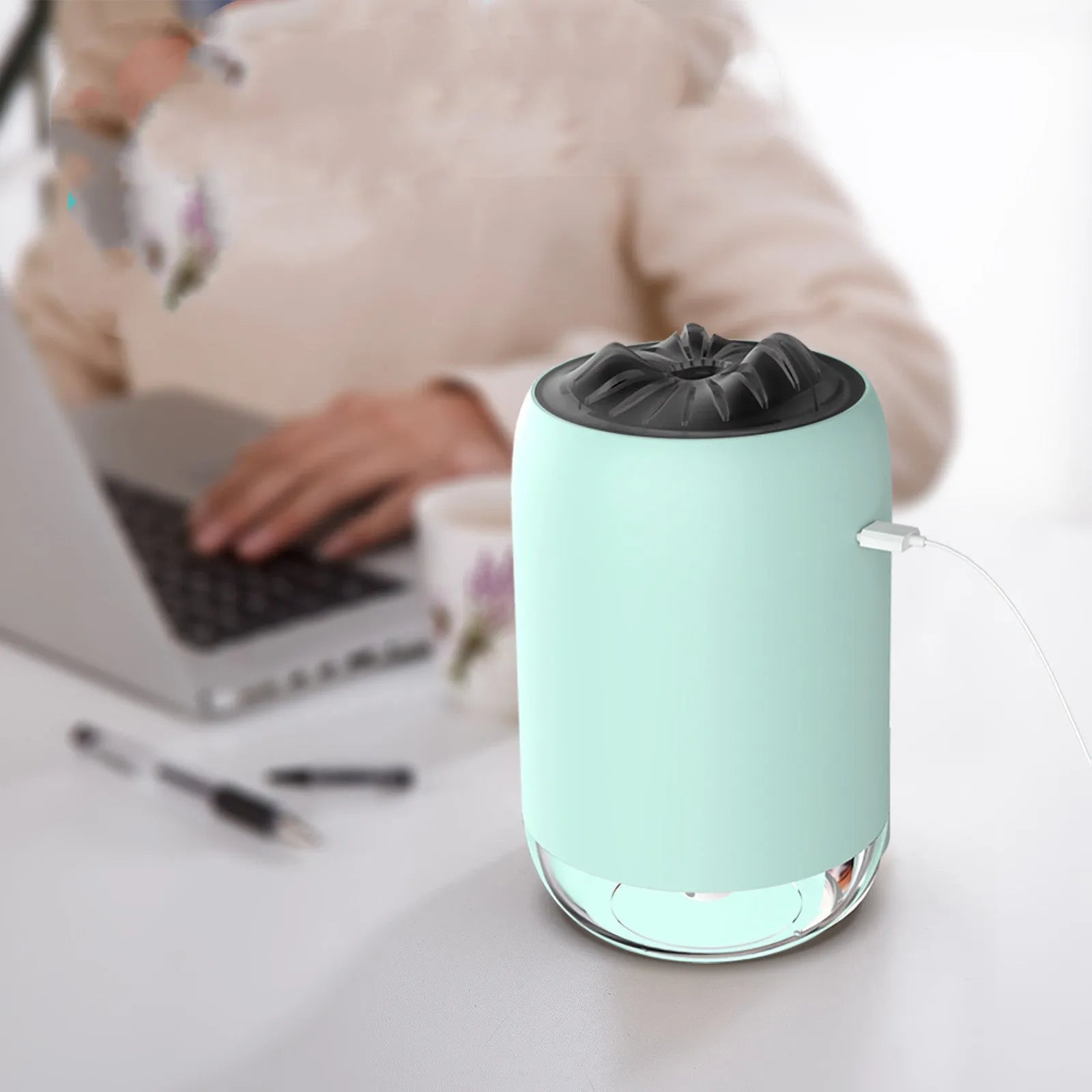 Magic Flame ultrasonic humidifier and aroma diffuser in white, light blue or pink column design.