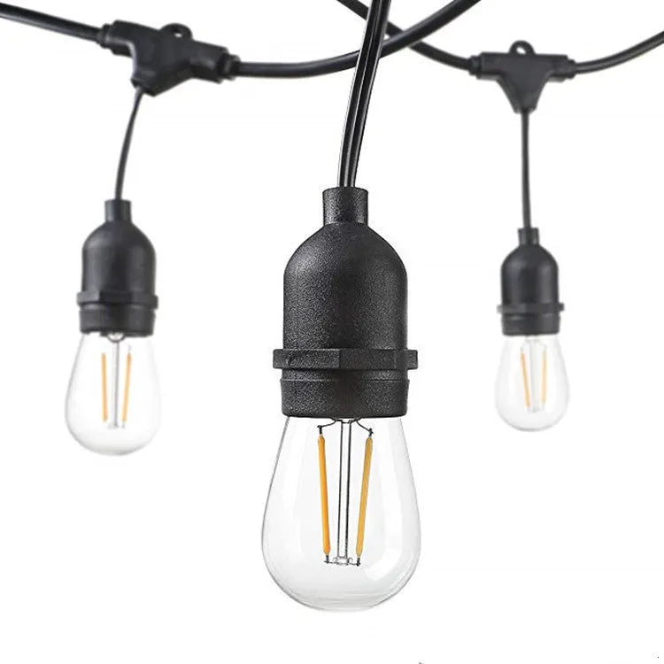 Black decorative light string on a reel showing EU plug, available in 15m or 5m lengths.