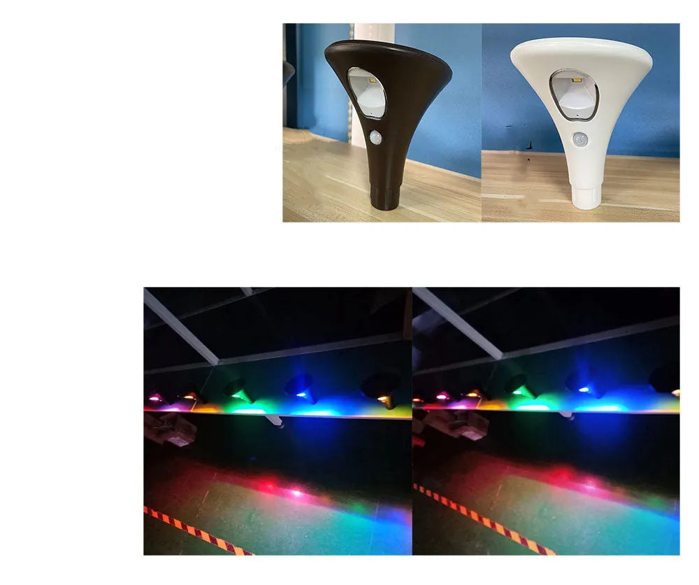 Solar-powered ground spike garden light with lamp pole on green lawn