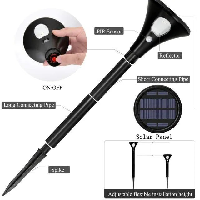 Solar-powered ground spike garden light with lamp pole on green lawn