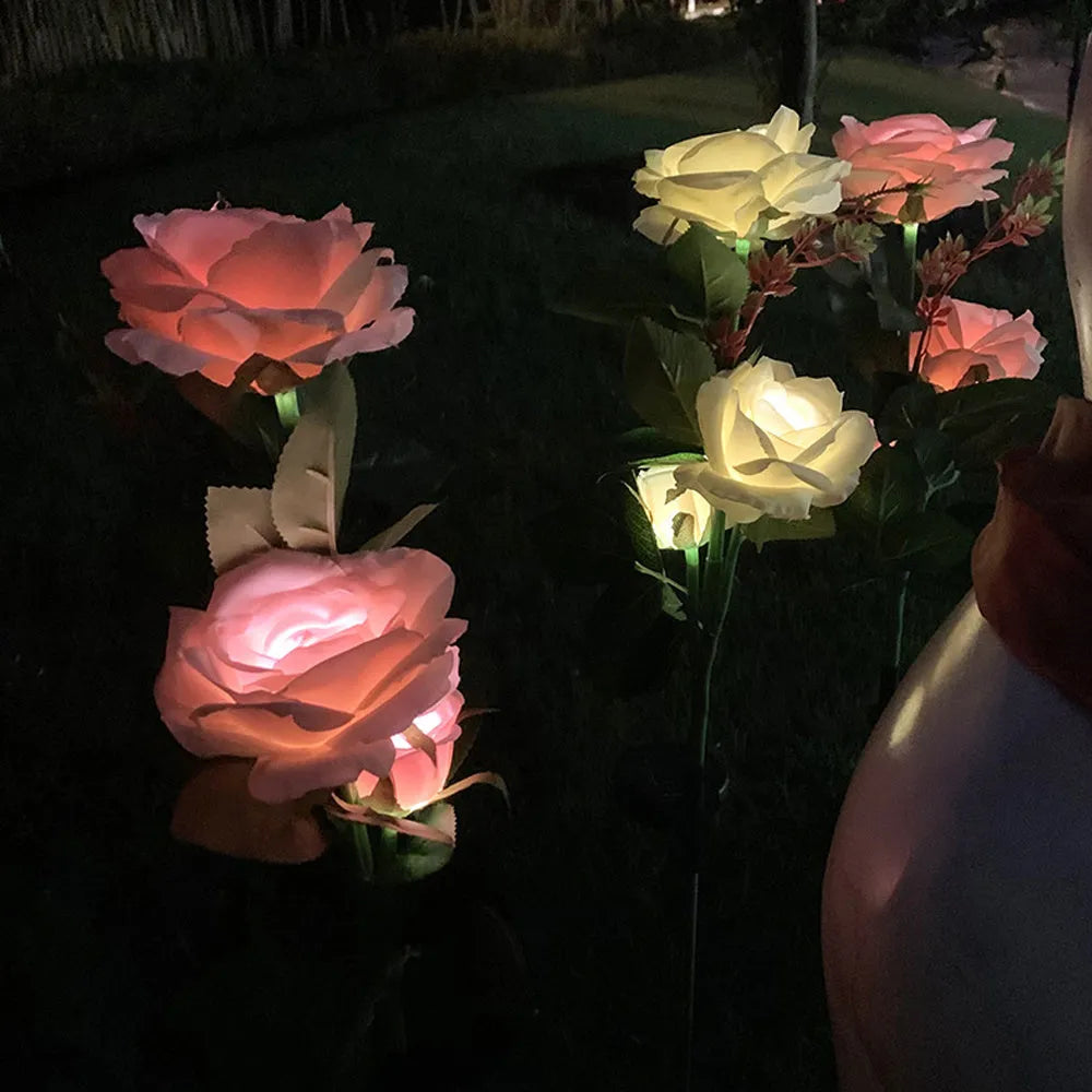 Outdoor solar rose garden lamp with three white LED light heads on stainless steel stem