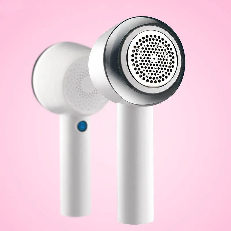 White rechargeable handheld clothes shaver and beater for jumpers
