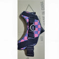 US Style nylon dog harness with adjustable neck, reflective chest contour and stainless steel ring, sizes XS to 2XL.