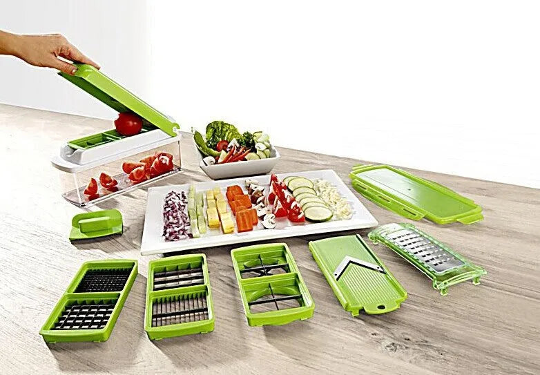Green 12-piece manual vegetable chopper and food dicer set with stainless steel blades on a kitchen counter.