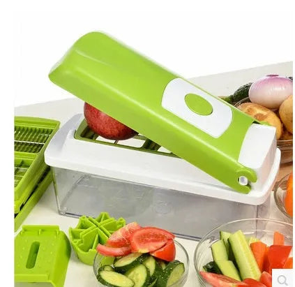 Green 12-piece manual vegetable chopper and food dicer set with stainless steel blades on a kitchen counter.