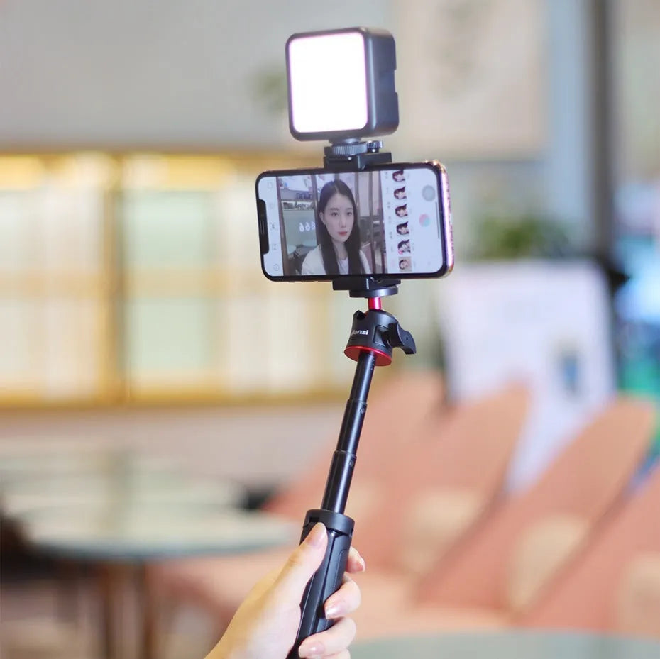 Combo 8 mobile phone vlog bracket set with integrated fill light and a separate phone stand.