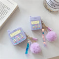Purple silicone AirPods protective case with clamshell design and attached fur ball pendant