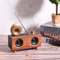 Home wireless horn flower Bluetooth speaker in dark wood finish with front grille and controls