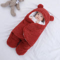 Cotton blend baby sleeping bag wrapper in a quilted plain pattern, shown in a choice of colours.