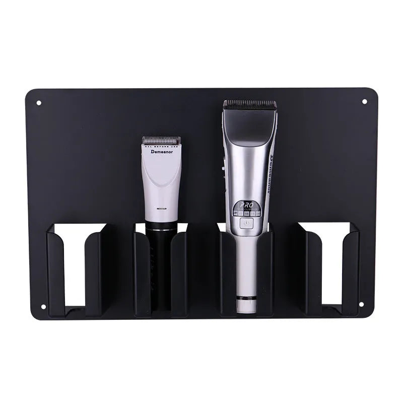Black plastic wall-mounted rack holding four hair clippers with included screws for installation.